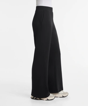 Брюки клеш из мягкой ткани с модалом- Заказать в России