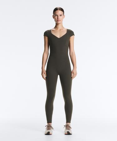 OYSHO Длинный комбинезон EVERMOVE с коротким рукавом купить с доставкой.