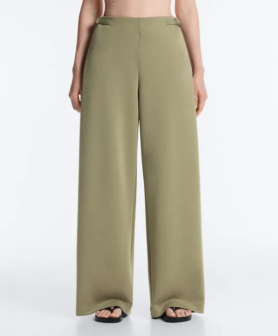 Широкие брюки-пике  с пряжками- Заказать в России