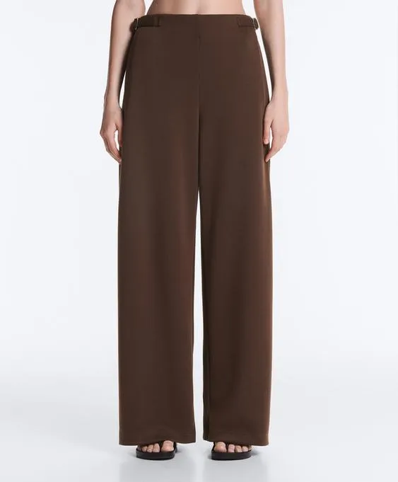 Широкие брюки-пике  с пряжками- Заказать в России