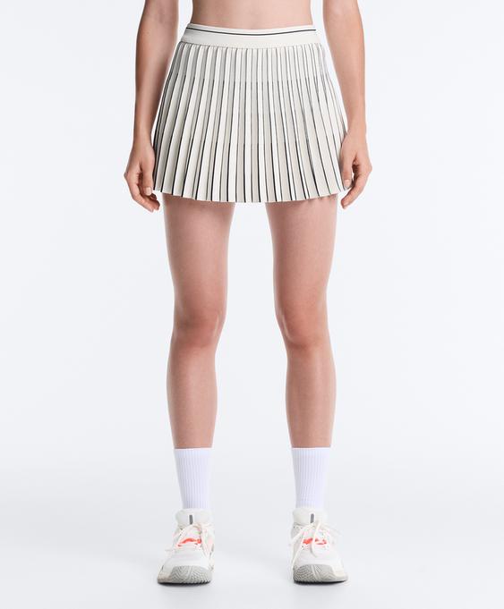 OYSHO Короткая юбка  SEAMLESS со складками купить с доставкой.