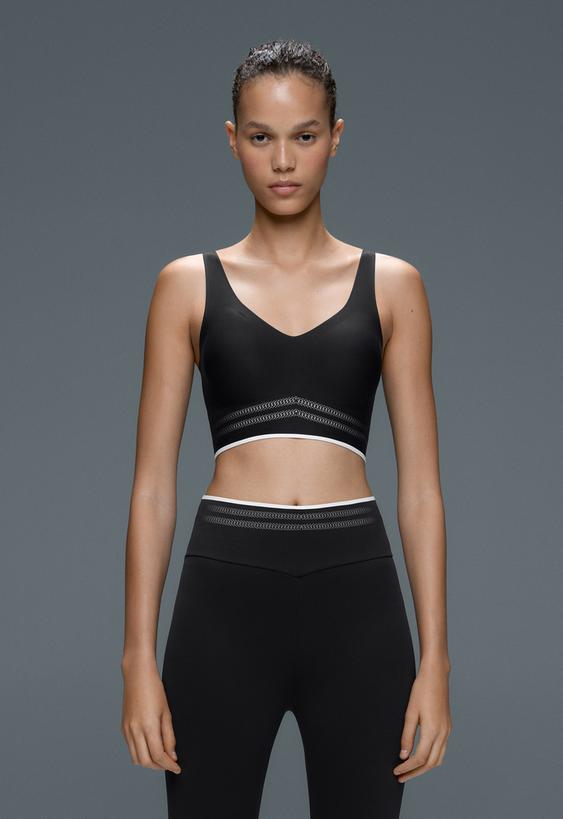 OYSHO Спортивный топ средней поддержки PERFECT-ADAPT с кантиком купить с доставкой.