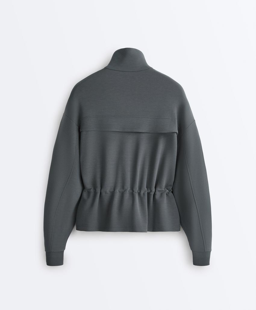 Soft-touch modal jacket with adjustable waist and high collar