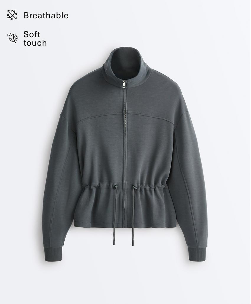Soft-touch modal jacket with adjustable waist and high collar