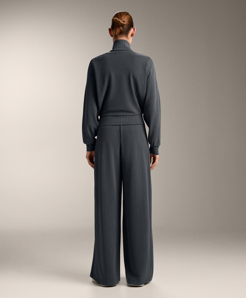 Брюки с асимметричными полосками из модала