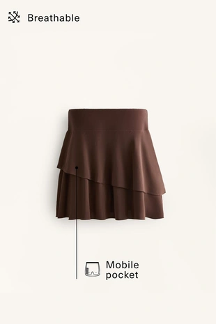 Короткая юбка с оборками- Заказать в России