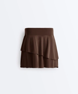 Короткая юбка с оборками- Заказать в России