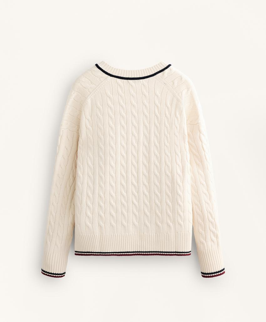 Джемпер мини с косами и v-образным вырезом