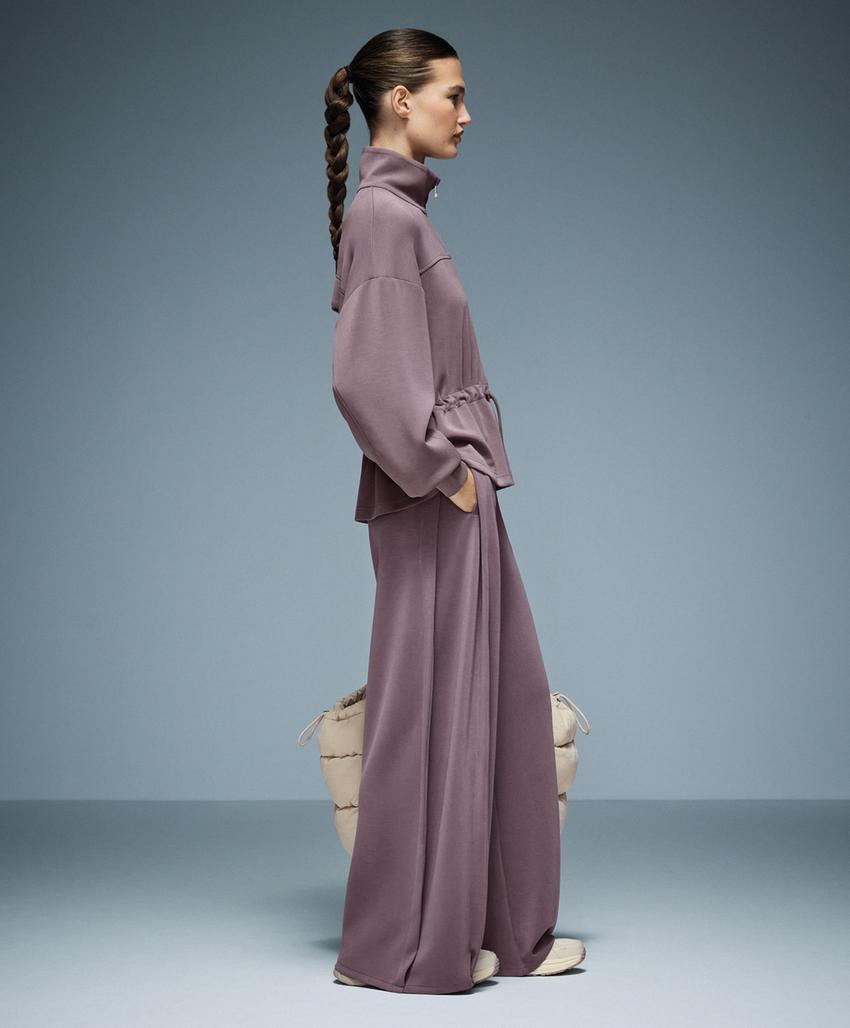 Широкие брюки с мягким прикосновением с боковым складкой и модалом