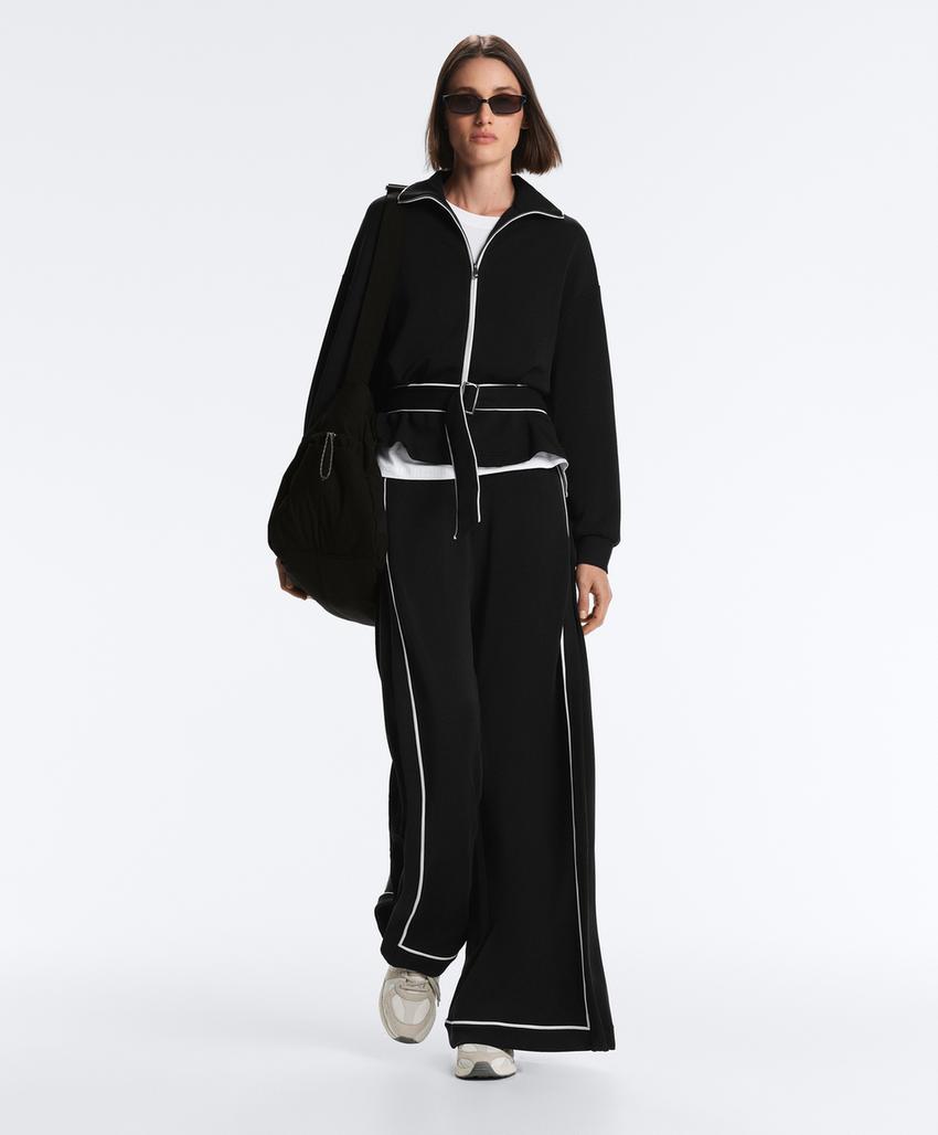 Широкие брюки из мягкого модала с контрастной окантовкой