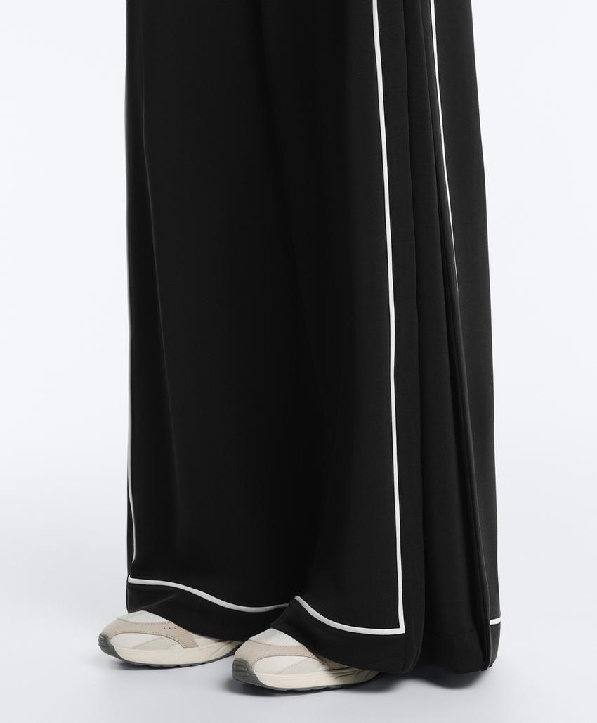 Широкие брюки из мягкого модала с контрастной окантовкой