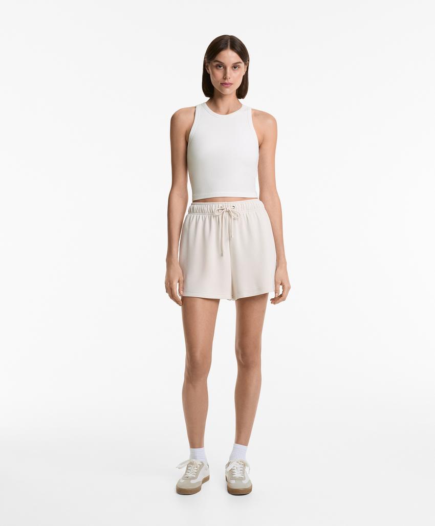 Удлиненный топ-майка в рубчик из смесового модала