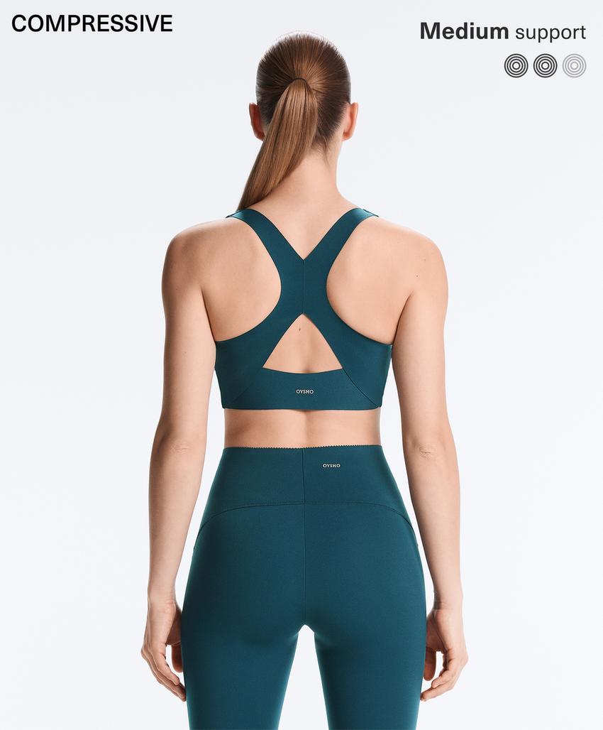 Сжимающий бюстгальтер средней поддержки с чашечками