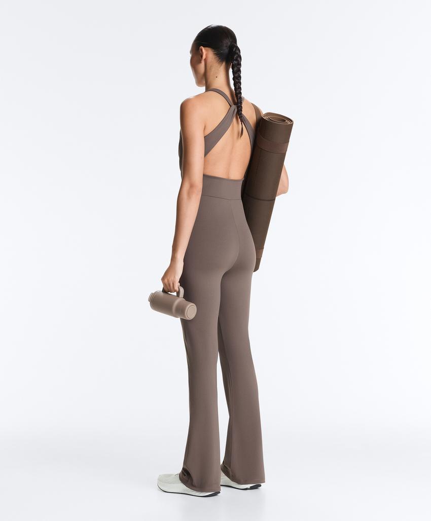 Длинный комбинезон Comfortlux Flare с перекрестными деталями