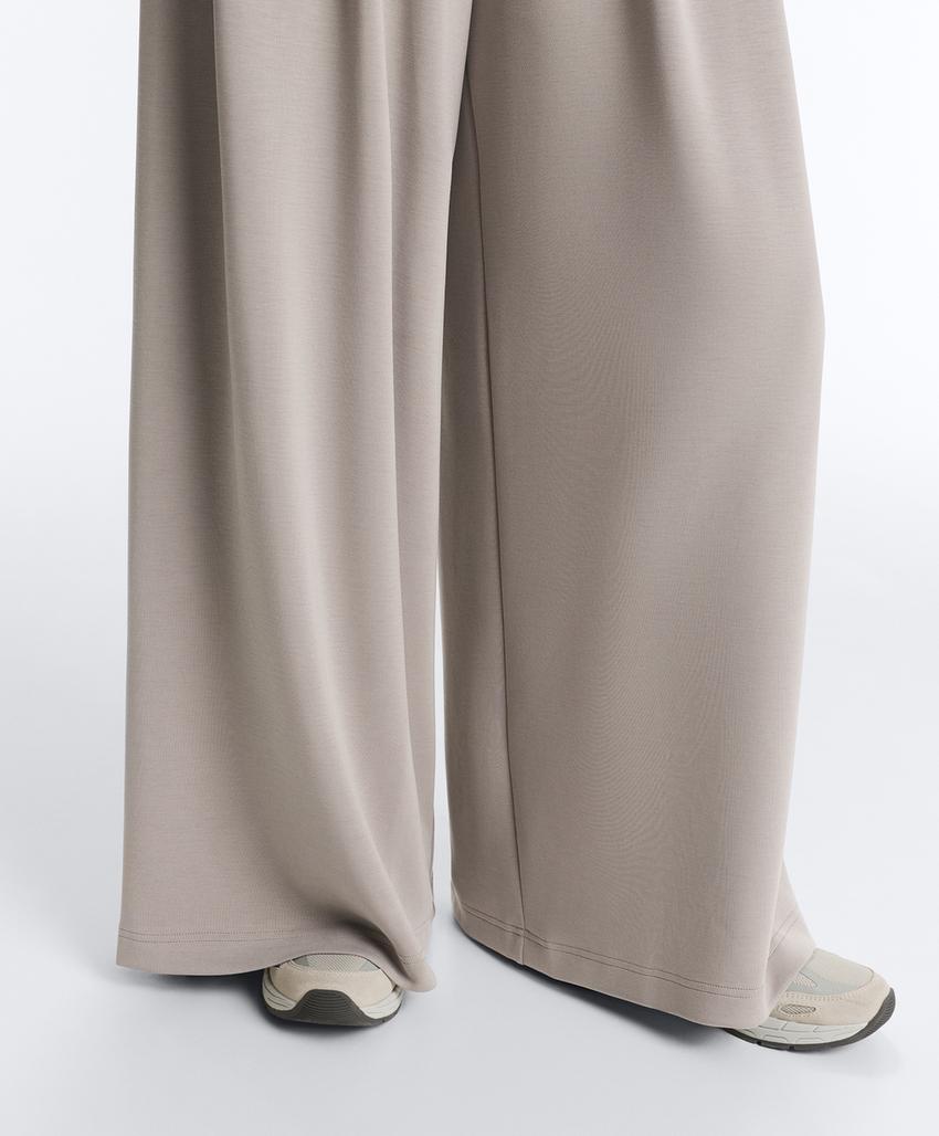 Широкие брюки с модалом и деталями под корсет