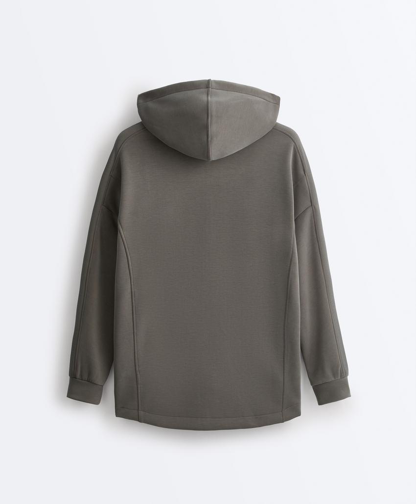 Длинная куртка с капюшоном и деталями из ребристого материала и футера