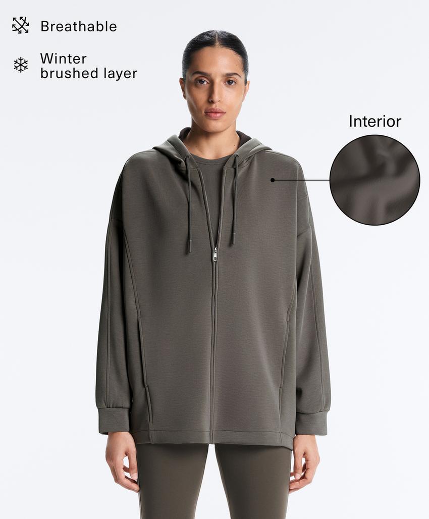 Длинная куртка с капюшоном и деталями из ребристого материала и футера