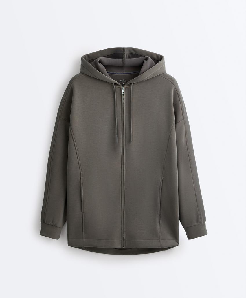 Длинная куртка с капюшоном и деталями из ребристого материала и футера