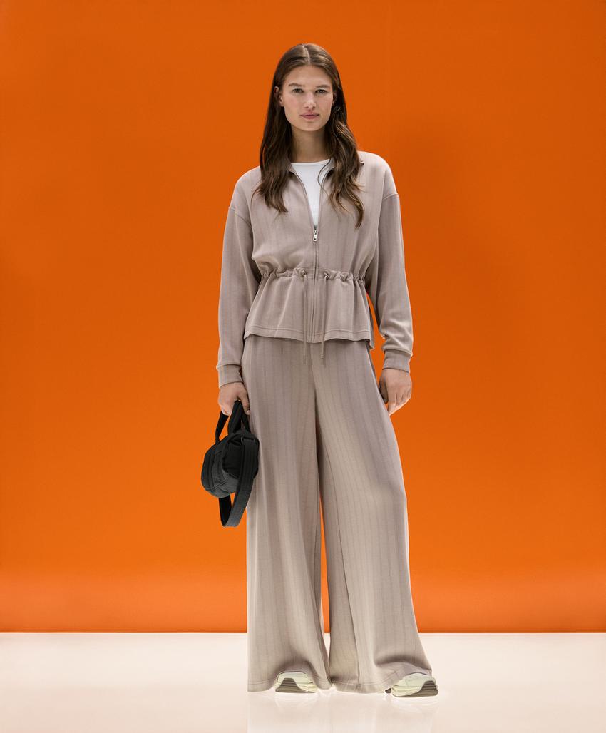 Soft-touch modal jacket with adjustable waist and high collar