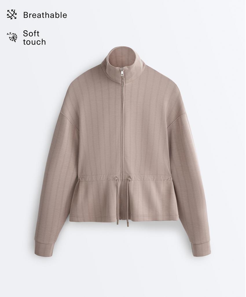 Soft-touch modal jacket with adjustable waist and high collar