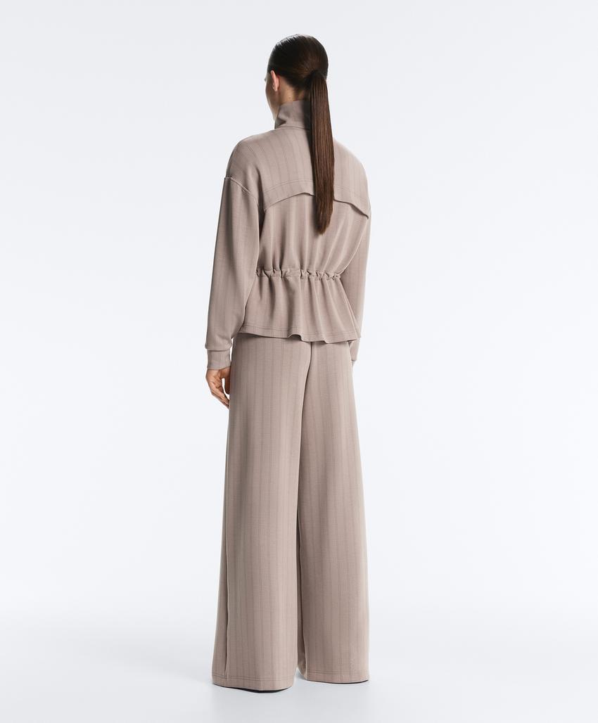 Soft-touch modal jacket with adjustable waist and high collar