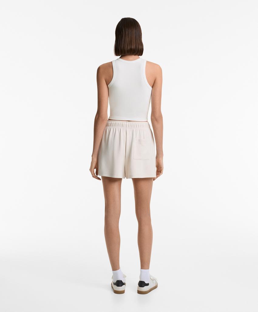 Длинный топ-бактоп из рубчатого модального микса