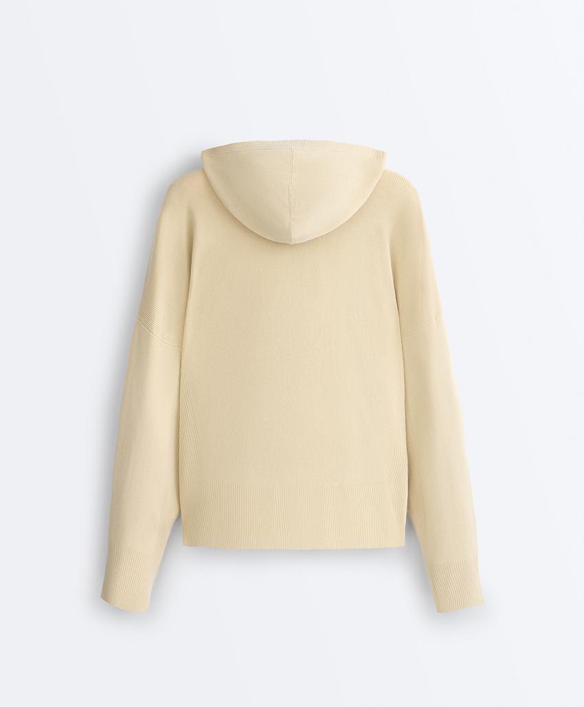 Длинная вязаная куртка с капюшоном