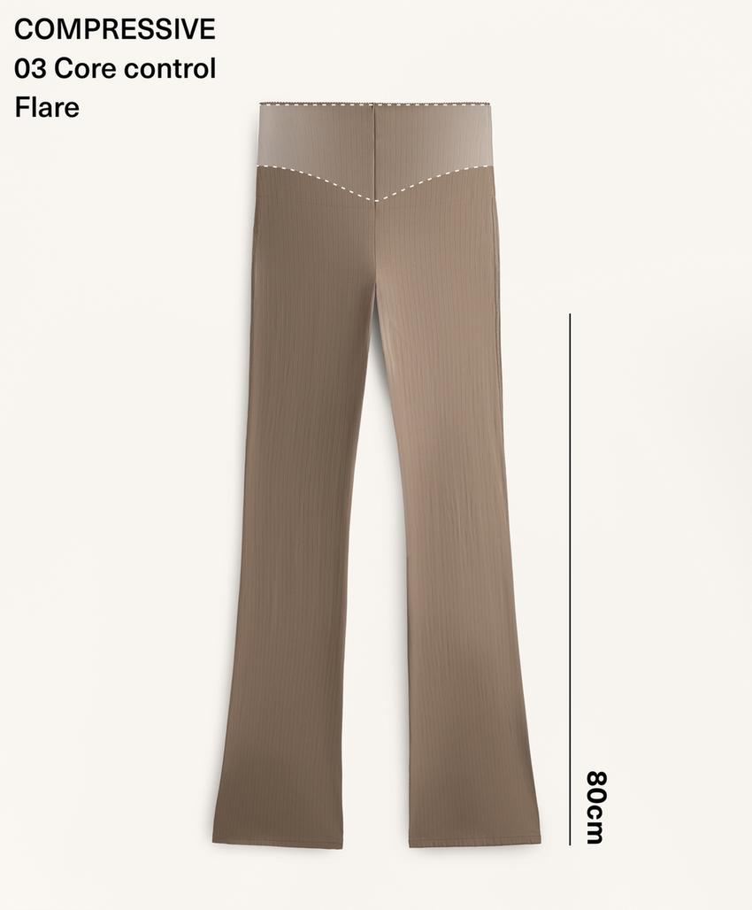 Брюки с высокой посадкой и разноцветной вставкой с контролем выравнивающего эффекта