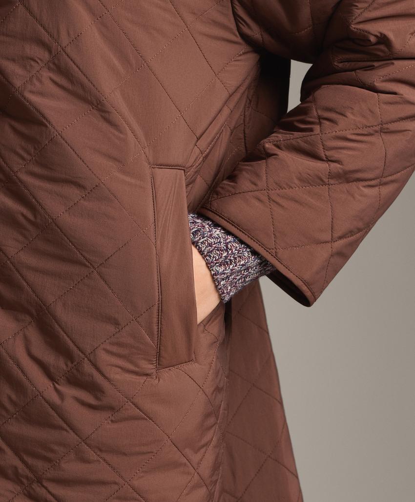 Длинный водоотталкивающий стеганый пуховик из fellex® aerogel