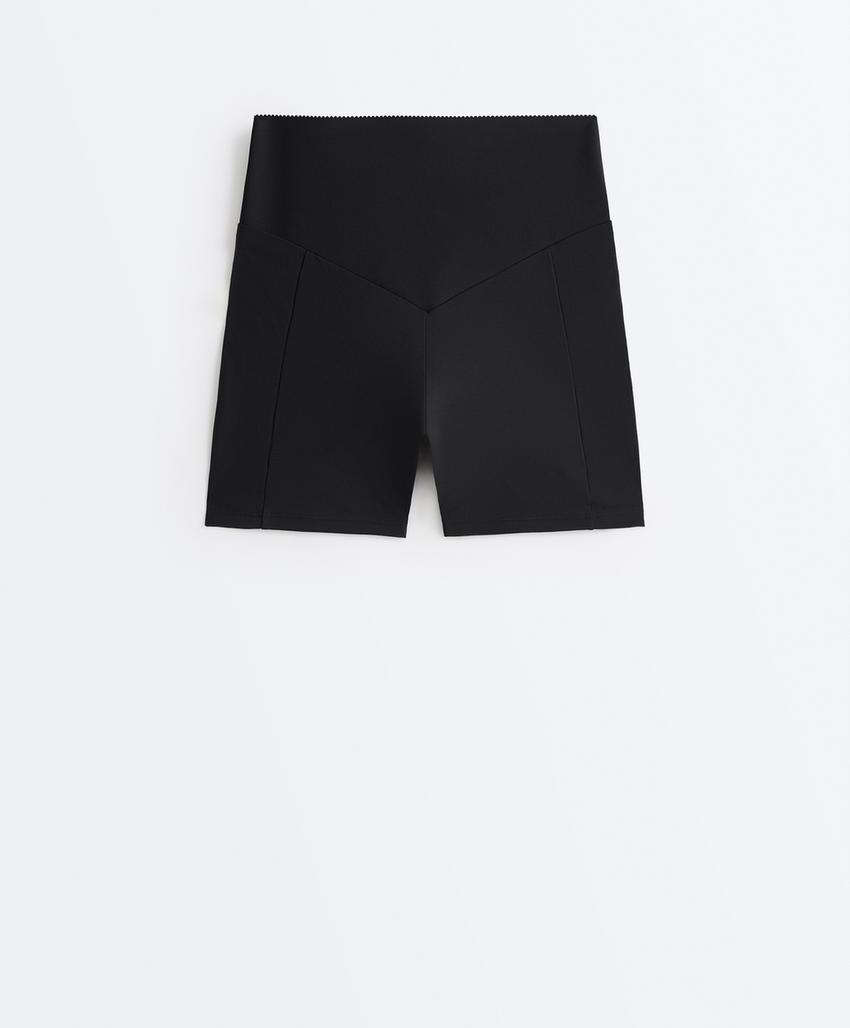 Высокие компрессионные шорты с карманами 10 см