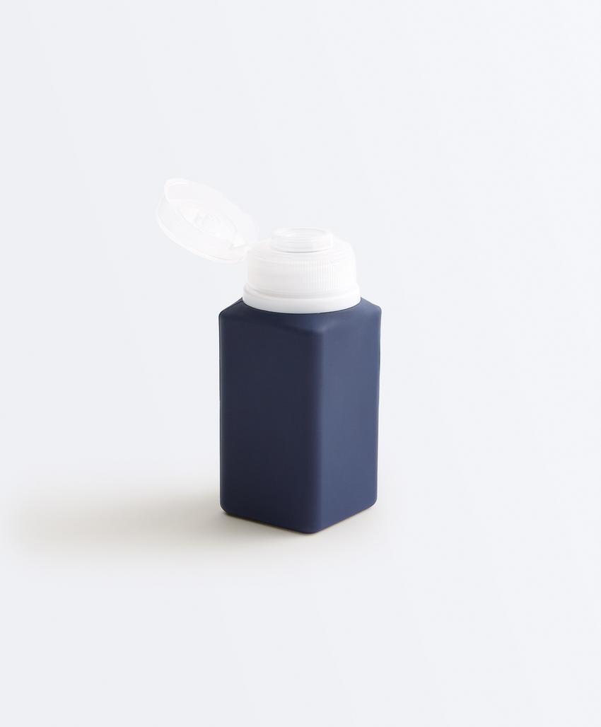 Дорожная косметичка и 4 флакона