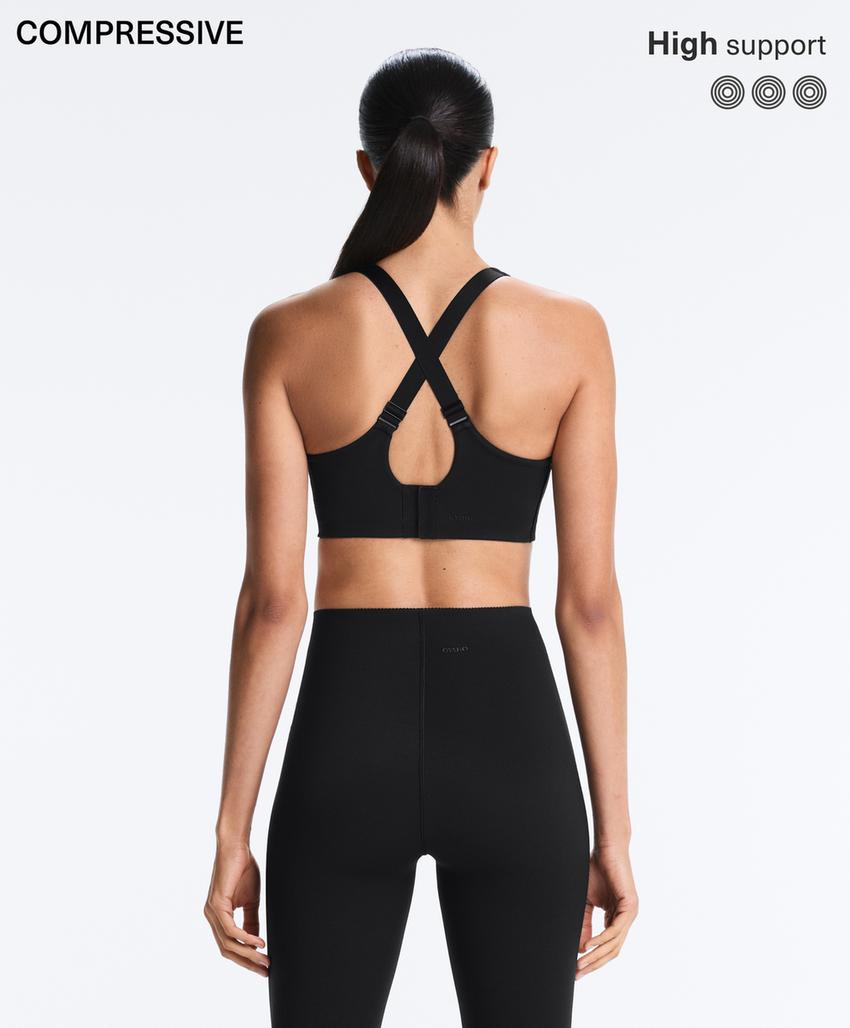 Compressive cross-back sports bra with firm support