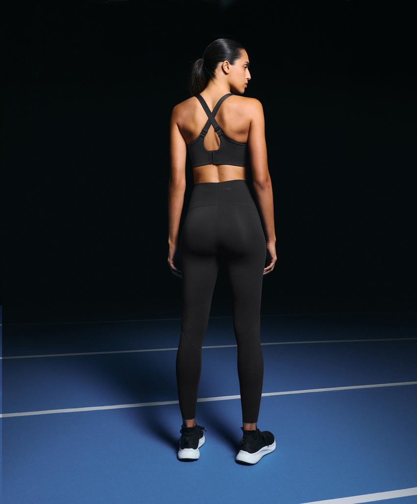 Compressive cross-back sports bra with firm support