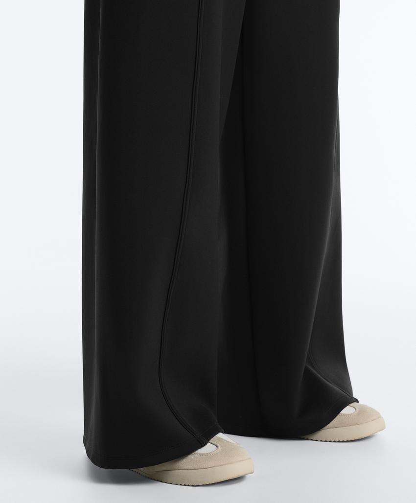 Широкие брюки с высокой посадкой эффекта неопрена