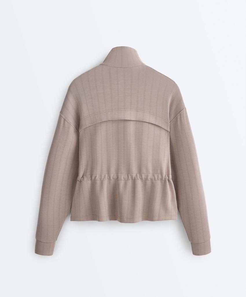 Soft-touch modal jacket with adjustable waist and high collar