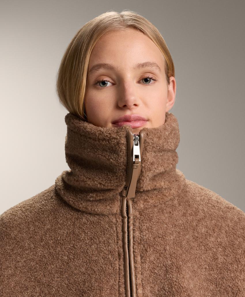 Длинный пальто из мягкой искусственной овчины