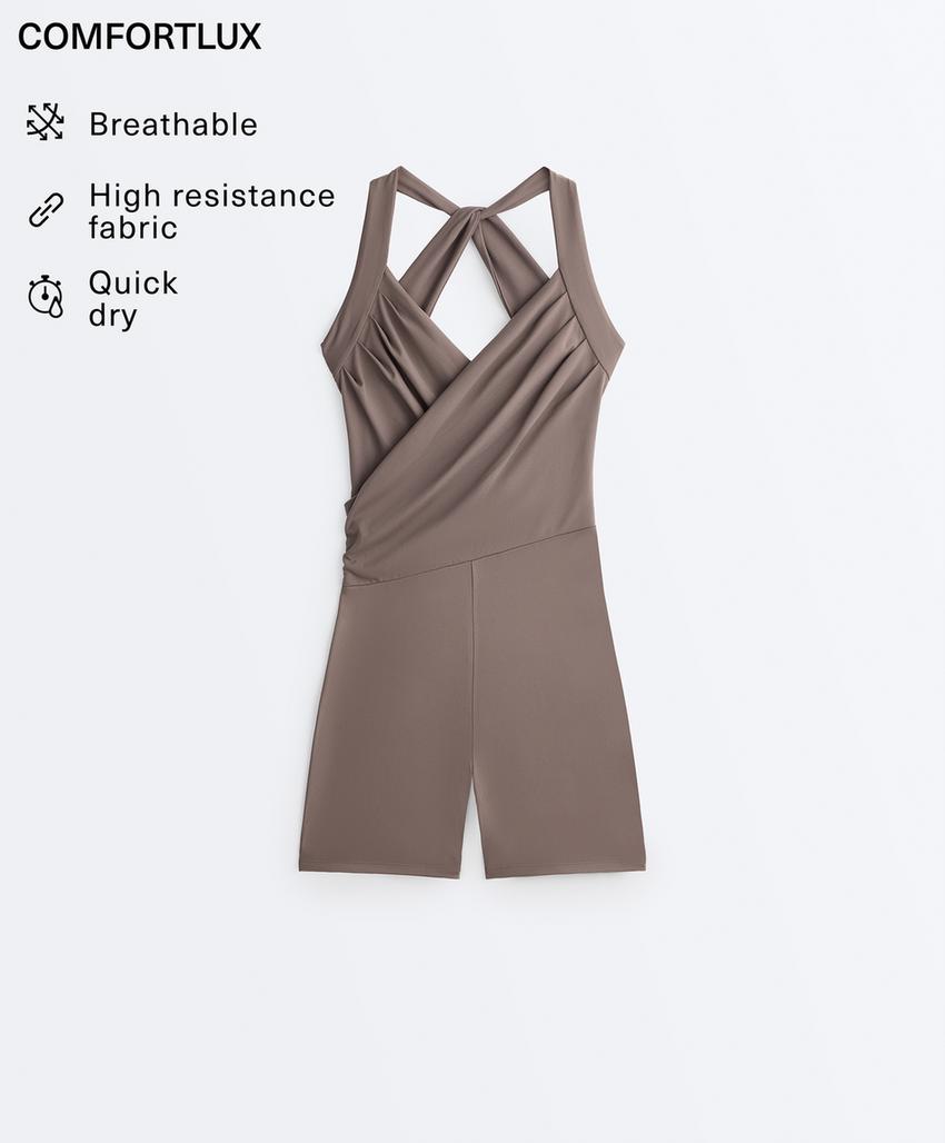 Короткий комбинезон Comfortlux с перекрестным вырезом
