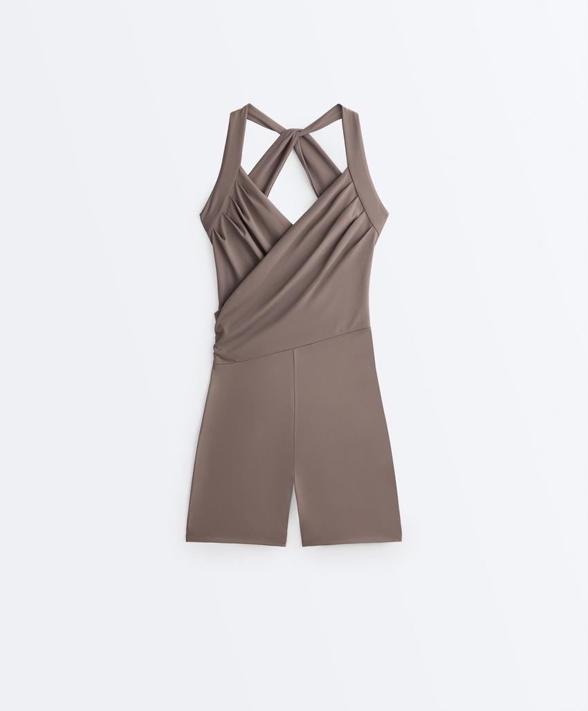 Короткий комбинезон Comfortlux с перекрестным вырезом