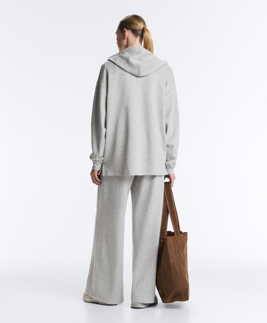 Длинная куртка с капюшоном из меланжевого пике