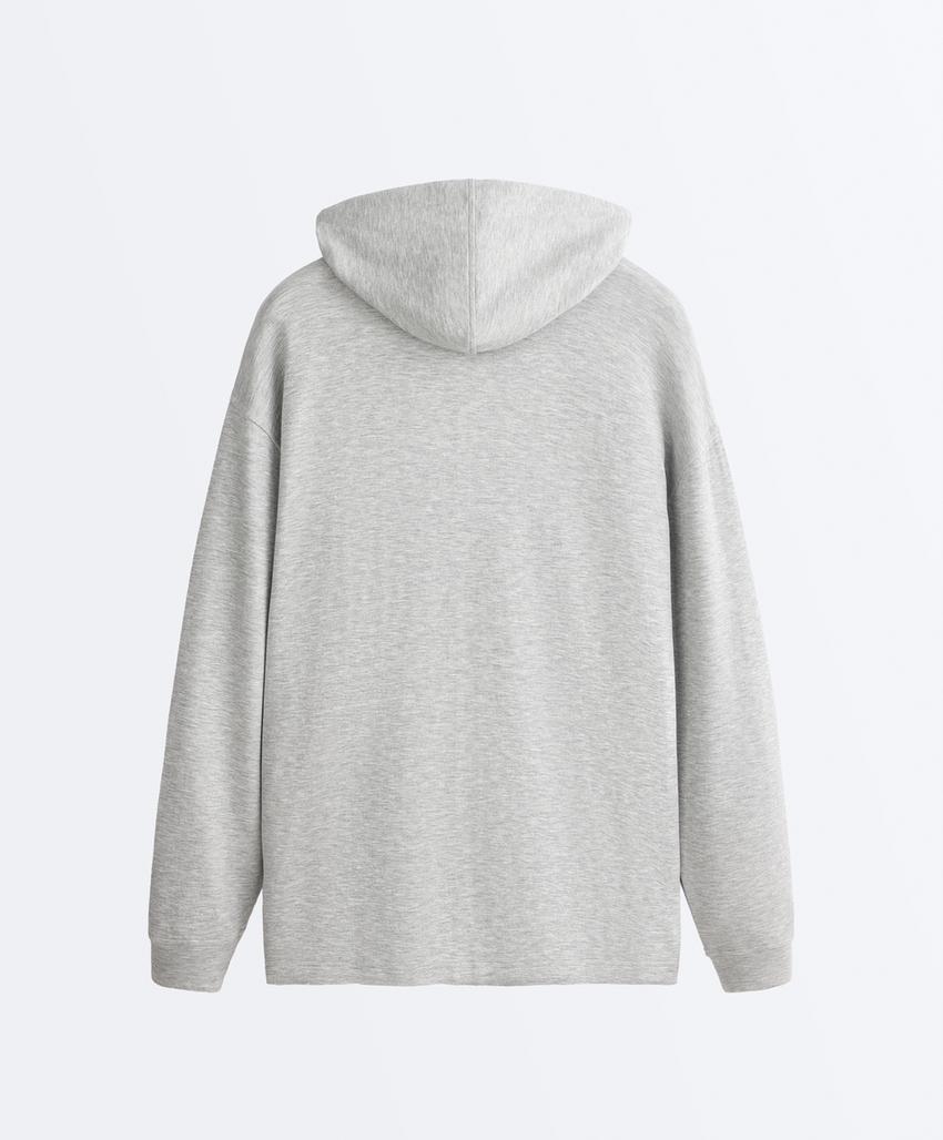 Длинная куртка с капюшоном из меланжевого пике