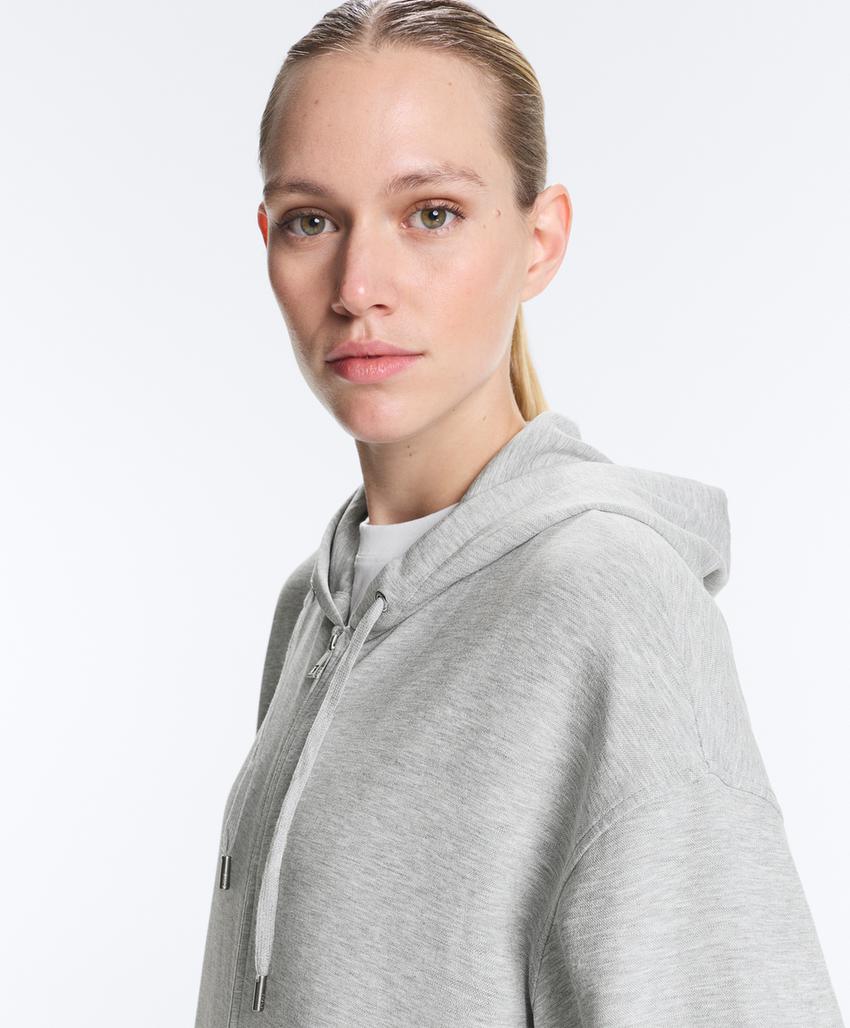 Длинная куртка с капюшоном из меланжевого пике