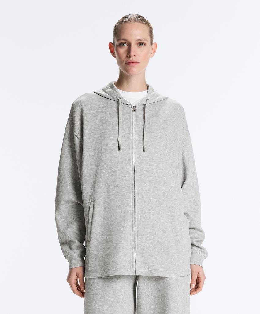 Длинная куртка с капюшоном из меланжевого пике