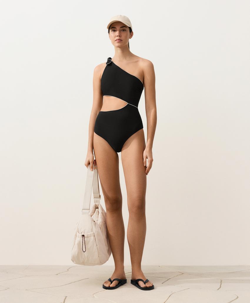 Трикини с асимметричным бантом и обшивкой