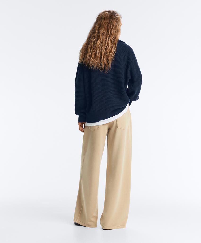 Вязаная куртка с высоким воротником