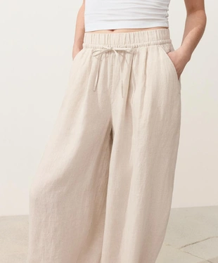 Брюки-бананы со складками из 100%-го льна- Заказать в России