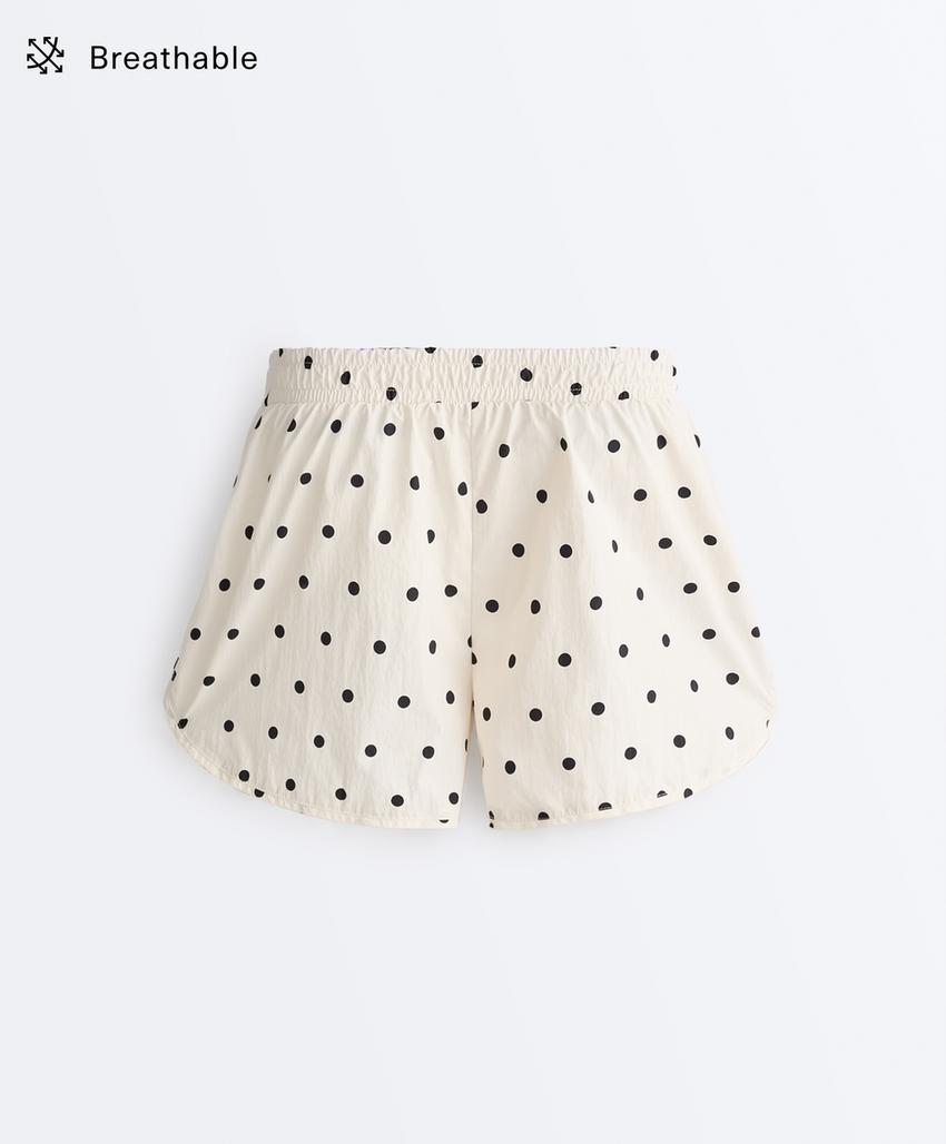 Высокотехнологичные шорты в горошек