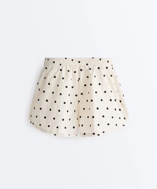 Высокотехнологичные шорты в горошек- Заказать в России