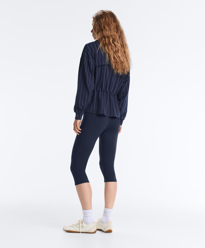 Soft-touch modal jacket with adjustable waist and high collar