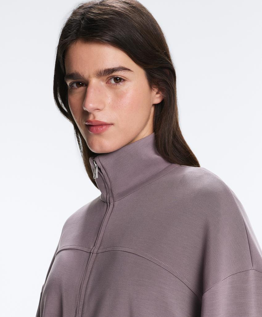 Soft-touch modal jacket with adjustable waist and high collar