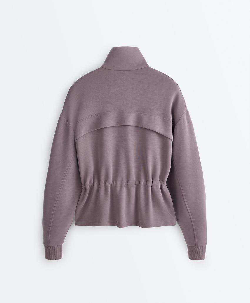 Soft-touch modal jacket with adjustable waist and high collar